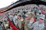 Delaware National Guard Soldiers and Airmen swear in as District of Columbia special police at FedEx Field in Landover, Md., Jan. 19, 2017. The DNG members are here in preparation of the 58th Presidential Inauguration. During the historic event, National Guard troops from almost every state and territory will provide several critical functions including crowd management, traffic control, emergency services, logistics, and ceremonial marching elements. 