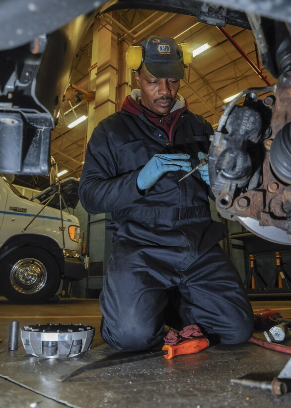 Miguel Williams, 11th Logistics Readiness Squadron automotive technician, resurfaces a rotor on an Air Force Office of Special Investigations vehicle at Joint Base Andrews, Md., Jan. 18, 2017. OSI will utilize this and a number of other vehicles to complete their roles in support of the 58th Presidential Inauguration. (U.S. Air Force photo by Staff Sgt. Stephanie Morris)