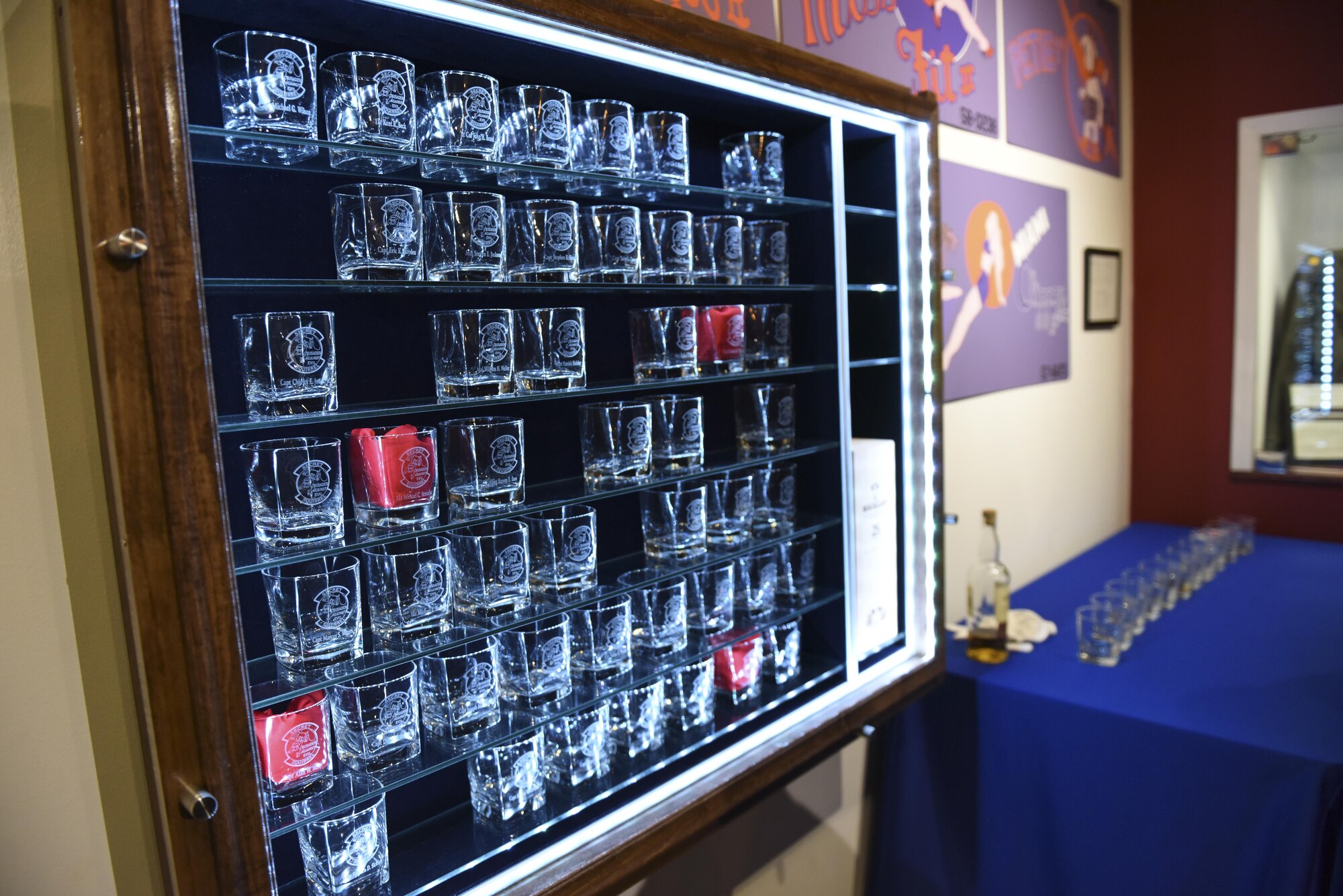 Glasses, engraved with the names of each Operation Secret Squirrel crewmember, sit on display at the Barksdale Global Power museum on Barksdale Air Force Base, La., Jan. 17, 2017. Jan. 16, 1991, seven B-52G Stratofortresses from Barksdale took off heading toward Iraqi targets, launched 35 conventional air launch cruise missiles, and returned in secret in support of Operation Desert Storm. The mission, Operation Senior Surprise, remained classified until Jan. 16. 1992, when the crewmembers who made the mission possible were presented with air, achievement and commendation medals for their efforts. (U.S. Air Force photo/Airman 1st Class Alexis Schultz)
