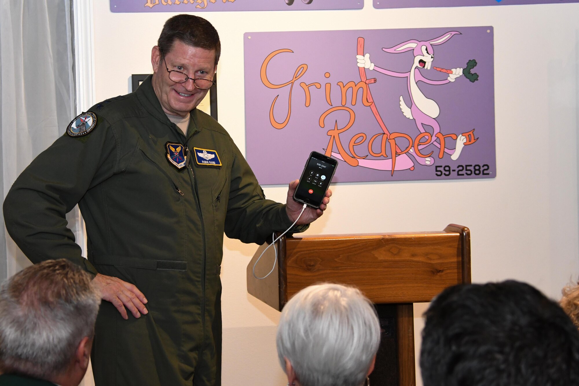 U.S. Air Force General Robin Rand, Air Force Global Strike Command commander, listens intently as Lt. Col. (retired) Richard Cole, speaks to the audience gathered to commemorate the twenty-sixth anniversary of Operation Senior Surprise, better known as “Secret Squirrel”, at Barksdale Air Force Base, La., Jan. 17, 2017.   Cole is the last surviving member of Doolittle’s Raiders, the group of Airmen that first bombed Tokyo during World War II.   During his talk, Cole drew comparisons between the Doolittle’s Raid and Secret Squirrel.  He said both missions pushed the boundaries of modern airpower and proved that no enemy was out of range for the Air Force (U.S. Air Force photo by Tech. Sgt. Ted Daigle/Released)