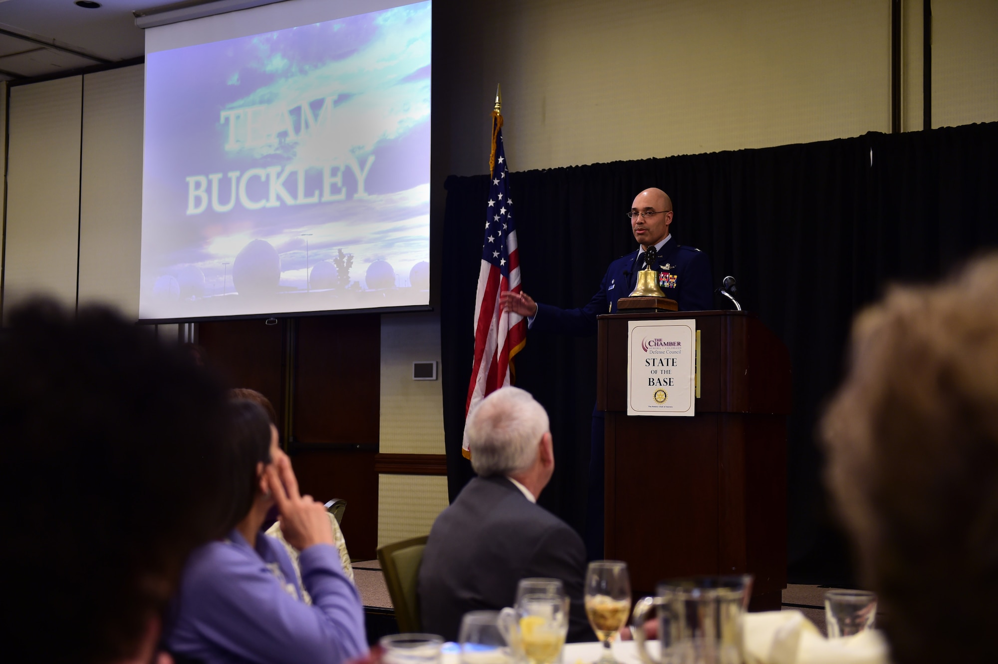 Col. David Miller Jr., 460th Space Wing commander on Buckley Air Force Base, Colo., addresses community leaders at the annual State of the Base, Jan. 18, 2017, in Aurora. The State of the Base allows the installation commander to review the accomplishments of 2016, and give a preview of what is to come in 2017.