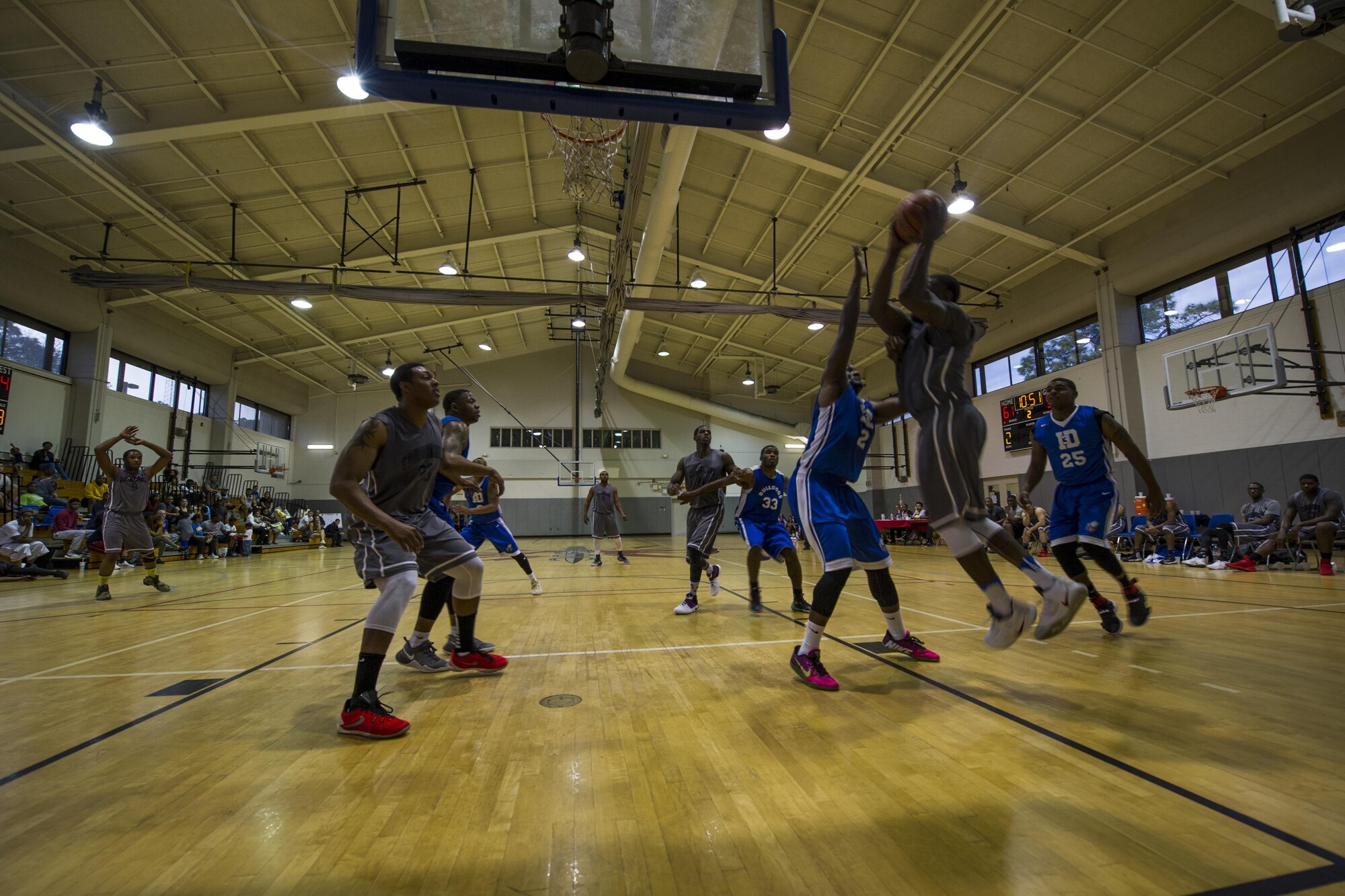 A member of Hurlburt Field’s basketball team attempts to shoot during a basketball tournament at the Aderholt Fitness Center on Hurlburt Field, Fla., Jan. 15, 2017. The 1st Special Operations Force Support Squadron hosted the 2nd annual commemorative basketball tournament to celebrate Martin Luther King Jr. Day, which is observed on the third Monday of January. (U.S. Air Force photo by Airman 1st Class Joseph Pick)