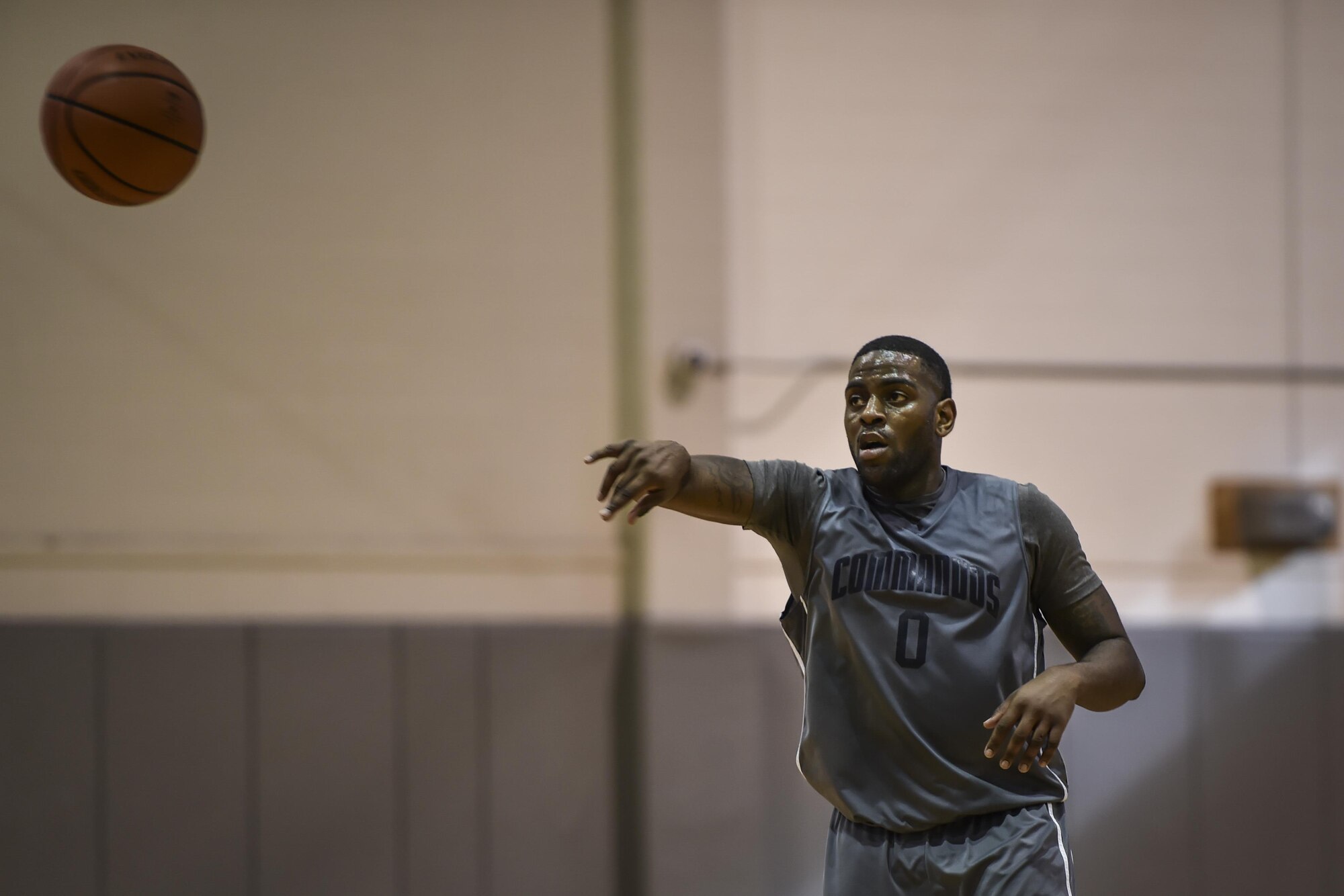 Brian Washington, a member of Hurlburt Field’s basketball team, passes a ball during a basketball tournament at the Aderholt Fitness Center on Hurlburt Field, Fla., Jan. 15, 2017. Eight Air Force teams from nearby bases competed in the two-day, double-elimination tournament. Hurlburt Field finished second in the championship game against Maxwell Air Force Base in the 2nd annual Martin Luther King Jr. Day tournament. (U.S. Air Force photo by Airman 1st Class Joseph Pick)