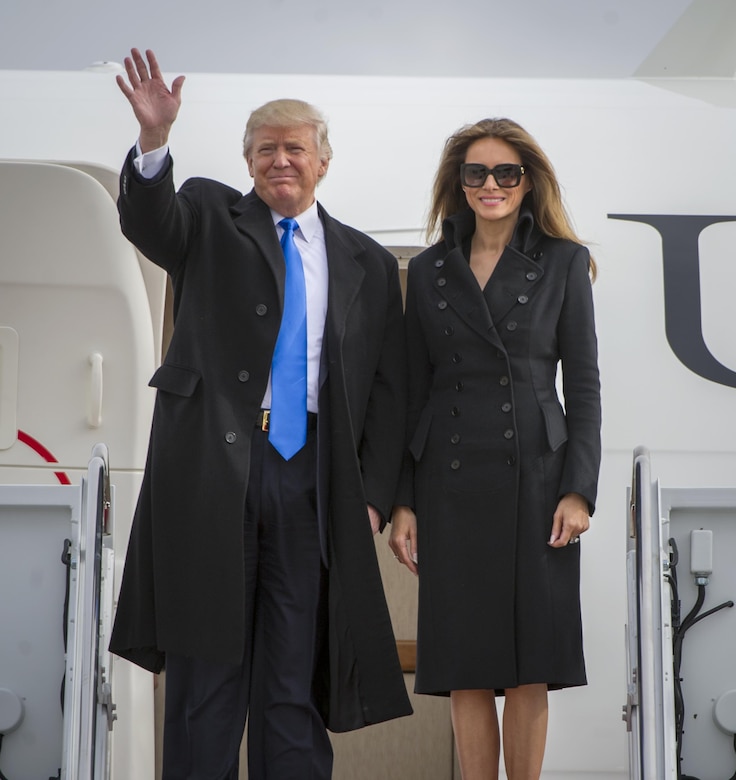 President-Elect Donald Trump waves to a crowd, alongside his wife, Melania Trump, as they depart an aircraft at Joint Base Andrews, Md., Jan. 19, 2017. Trump arrived here in preparation for the 58th Presidential Inauguration, Jan. 20, where he will take the oath as the President of the United States. (U.S. Air Force photo by Airman 1st Class Gabrielle Spalding)