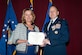 Air Force Secretary Deborah Lee James presents Col. Christopher C. Barnett, an Air War College faculty member, the Silver Star and the Silver Star first oak leaf cluster Jan. 19, 2017. James chose her last day as the secretary of the Air Force to honor Barnett for his gallantry in connection with 2009 military operations, as well as to announce upgraded medals awarded to seven additional Airmen. (US Air Force photo/Melanie Rodgers Cox)