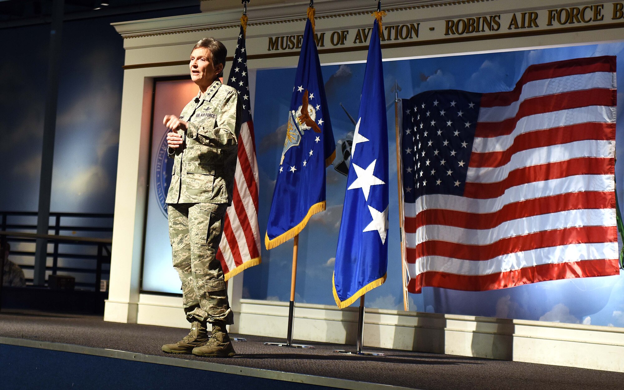 Gen. Ellen Pawlikowski, Air Force Materiel Command commander, speaks to members of Team Robins during her commanders call at the Museum of Aviation Century of Flight Hangar Jan. 18, 2017. During the commanders call, the general discussed the AFMC Strategic Plan, released in 2016, which established the following four goals: Increase AFMC's agility in order to best support the Air Force enterprise; Bolster trust and confidence of those AFMC serves; Drive cost-effectiveness into the capabilities the command provides; and, Recruit, develop and retain a diverse, high-performing and resilient team. In closing the general told the audience, "Thanks for what you do. It makes me proud to be a part of Air Force Materiel Command." (U.S. Air Force photo by Tommie Horton)