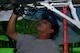 Rudy Olivarez, a Corrosion Control Specialist in the 12th Maintenance Group, applies paint to the landing gear of a T-38C Talon at Joint Base San Antonio-Randolph, Texas, Jan. 13, 2017.  Members of the corrosion control shop are changing the plane’s color scheme from two-tone gray to heritage blue, a scheme that was used by the 435th Fighter Training Squadron 40 years ago, ahead of a reunion of pilots that trained for fighter fundamentals after Jan. 1, 1977. (U.S. Air Force photo/Randy Martin) 