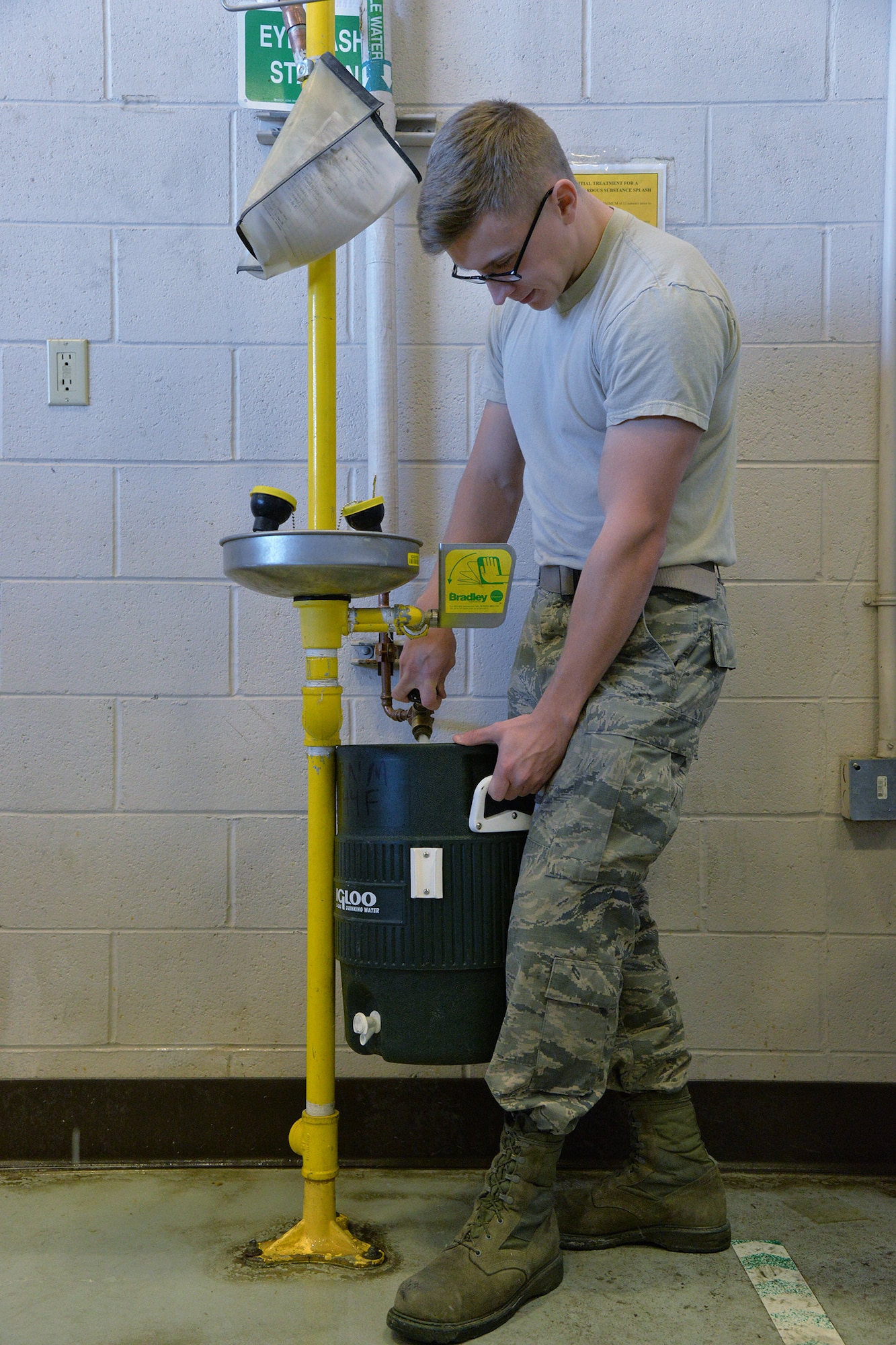 Airman 1st Class Nicolas Haneline, 341st Missile Maintenance Squadron maintenance technician, fills a water container before heading out to the missile field Jan. 17, 2017, at Malmstrom Air Force Base, Mont. Before each shift, teams load up a maintenance van with needed equipment and tools to be able to effectively work in Malmstrom’s missile complex. (U.S. Air Force photo/Airman 1st Class Daniel Brosam)