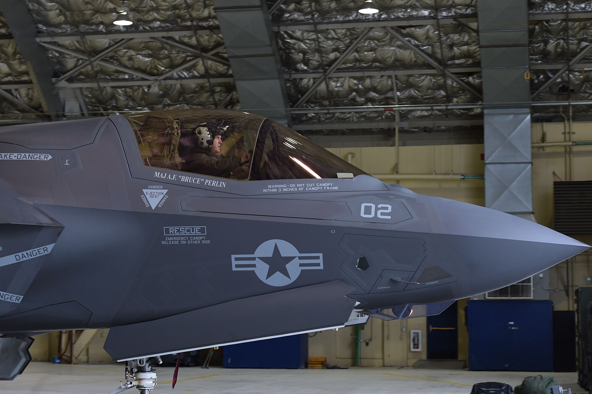Marines assigned to Marine Fighter Attack Squadron (VMFA) 121, 3rd Marine Aircraft Wing, move F-35Bs in a hangar, Jan. 13, 2017, during a stop on Joint Base Elmendorf-Richardson, Alaska, en route to Marine Corps Air Station Iwakuni, Japan. VMFA-121 is the first operational F-35B squadron in the Marine Corps, with its relocation to 1st Marine Aircraft Wing at Iwakuni. The F-35B was developed to replace the Marine Corps’ F/A-18 Hornet, AV-8B Harrier and EA- 6B Prowler. The Short Take-off Vertical Landing (STOVL) aircraft is a true force multiplier. The unique combination of stealth, cutting-edge radar and sensor technology, and electronic warfare systems bring all of the access and lethality capabilities of a fifth-generation fighter, a modern bomber, and an adverse-weather, all-threat environment air support platform.