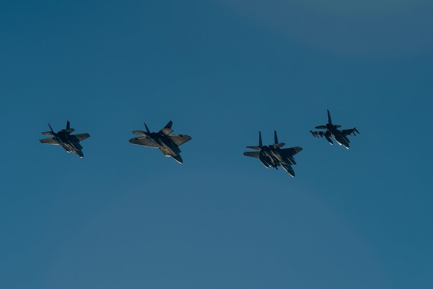 Capt. Skyler Collins and Maj. Caleb Edmondson, 335th Fighter Squadron F-15E Strike Eagle pilot and weapons system officer, fly a practice route, Jan. 19, 2017, in the skies over Seymour Johnson Air Force Base, North Carolina, in preparation for the official fly-over of the 58th Presidential Inauguration. The 335th FS F-15E Strike Eagle will fly in a four-ship formation alongside a 94th FS F-22 Raptor from Langley AFB, Virginia; a 58th FS F-35 Lightning II from Eglin AFB, Florida; and a 55th FS F-16 Fighting Falcon from Shaw AFB, South Carolina, during President-Elect Donald Trump's inauguration ceremony in Washington, Jan. 20, 2017. (U.S. Air Force photo by Airman Shawna L. Keyes)
