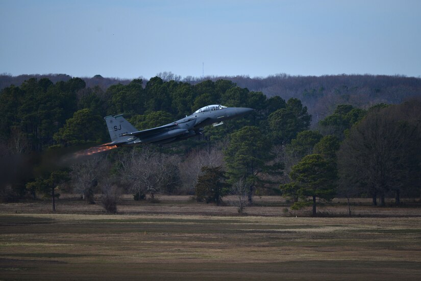 An F-15 Eagle takes off to perform a practice run for the inauguration flyover at Joint Base Langley-Eustis, Va., Jan. 19, 2017. The formation is comprised of an F-15 Eagle from Seymour Johnson Air Force Base, North Carolina, an F-16 Fighting Falcon from Shaw AFB, South Carolina, an F-22 Raptor from JBLE, Virginia, and an F-35 Lightning II from Eglin Air Force Base, Florida. (U.S. Air Force photo by Airman 1st Class Tristan Biese)