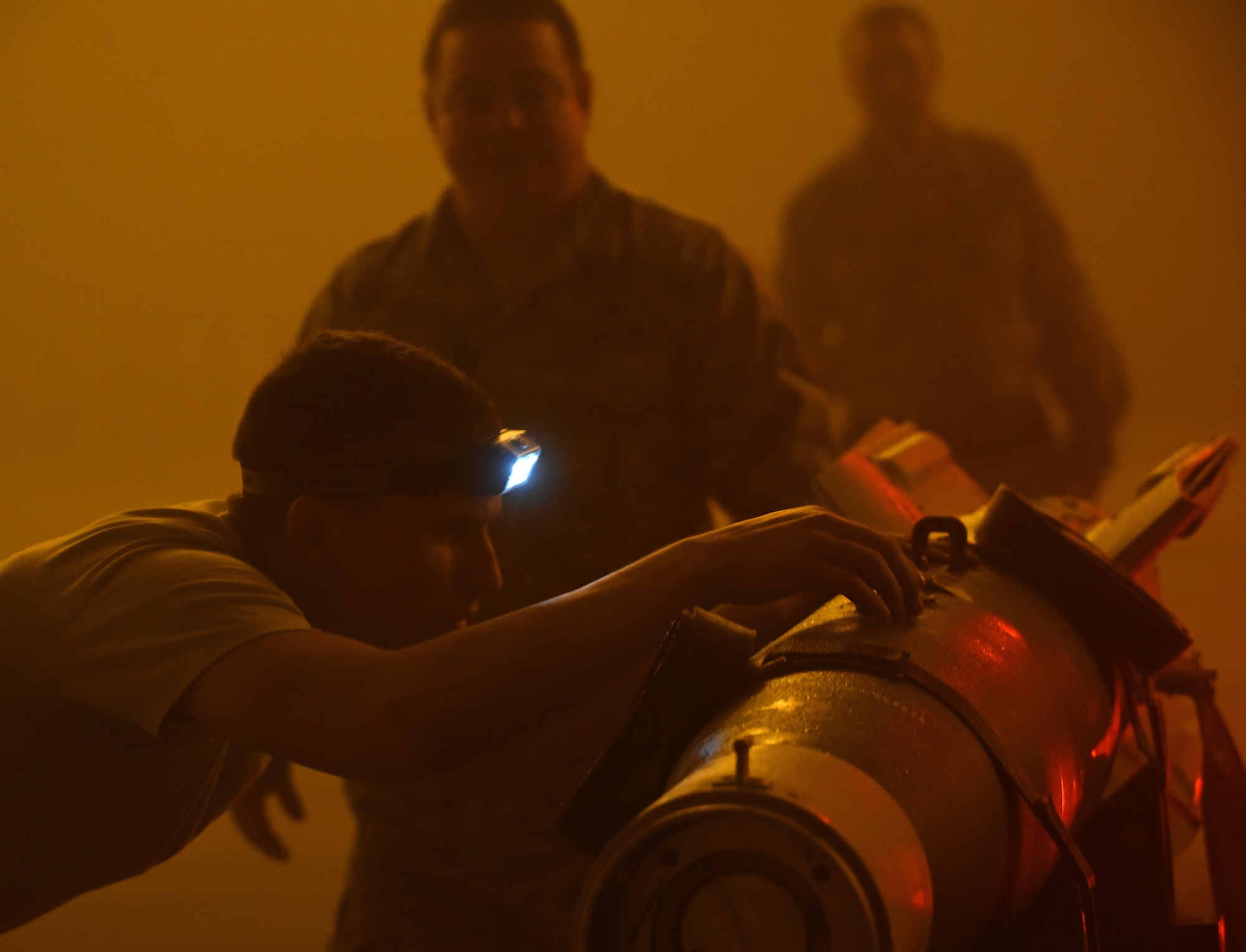 U.S. Air Force Airman 1st Class Jacob Chandler, 33rd Aircraft Maintenance Squadron aircraft armament systems journeyman, inspects a GBU-12 to ensure it is safe to load into an F-35A January 18, 2017, at Eglin Air Force Base, Florida. The 33rd Fighter Wing loaded and released the Air Education and Training Command’s first live bombs from an F-35A. Six aircraft were loaded with armed GBU-12s, and two bombs were released over the Eglin Air Force Base range. (U.S. Air Force photo by Staff Sgt. Peter Thompson)