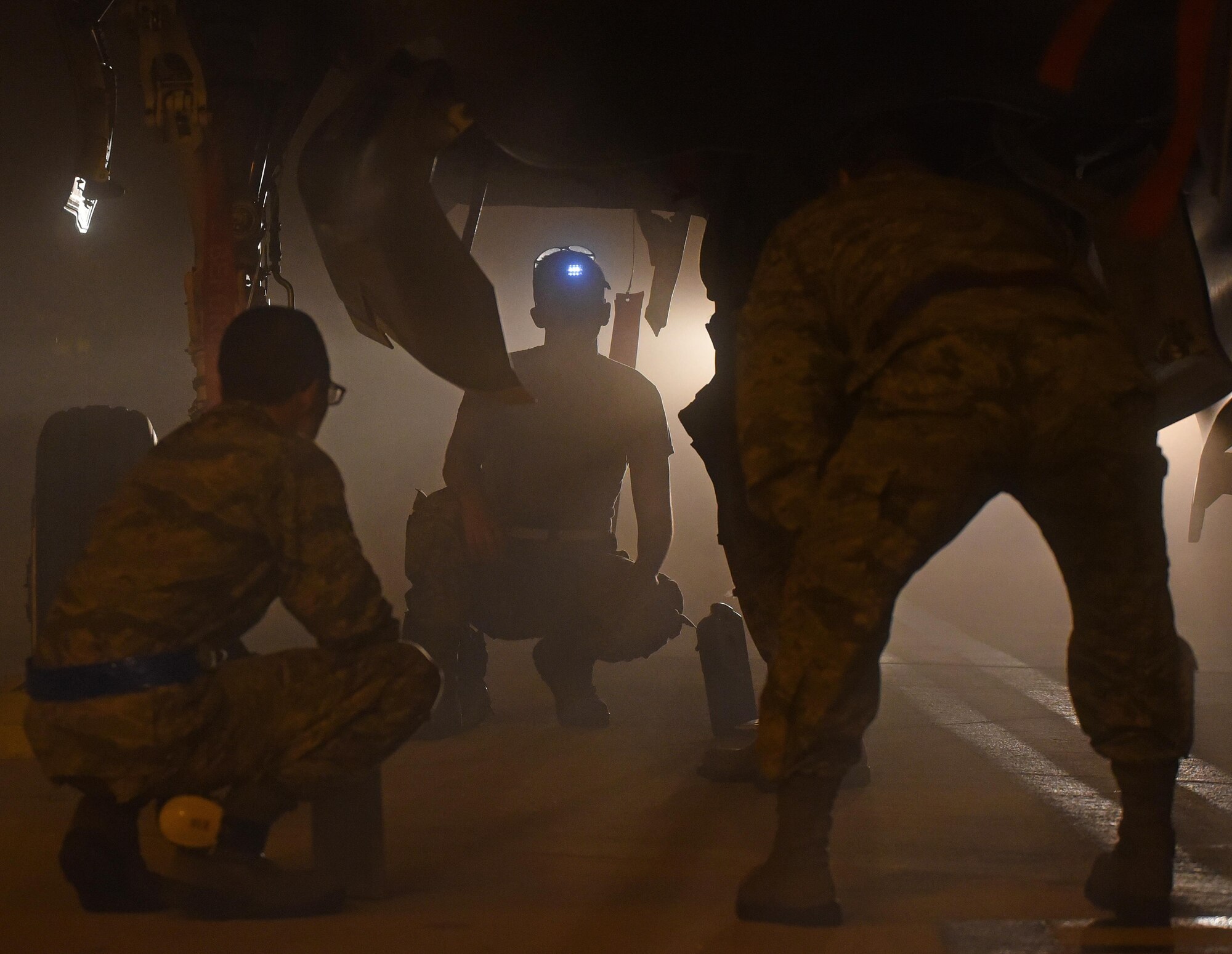 A U.S. Air Force weapons load crew assigned to the 33rd Aircraft Maintenance Squadron loads a live GBU-12 into an F-35A January 18, 2017, at Eglin Air Force Base, Florida. The 33rd Fighter Wing loaded and released the Air Education and Training Command’s first live bombs from an F-35A. Six aircraft were loaded with armed GBU-12s, and two bombs were released over the Eglin Air Force Base range. (U.S. Air Force photo by Staff Sgt. Peter Thompson)