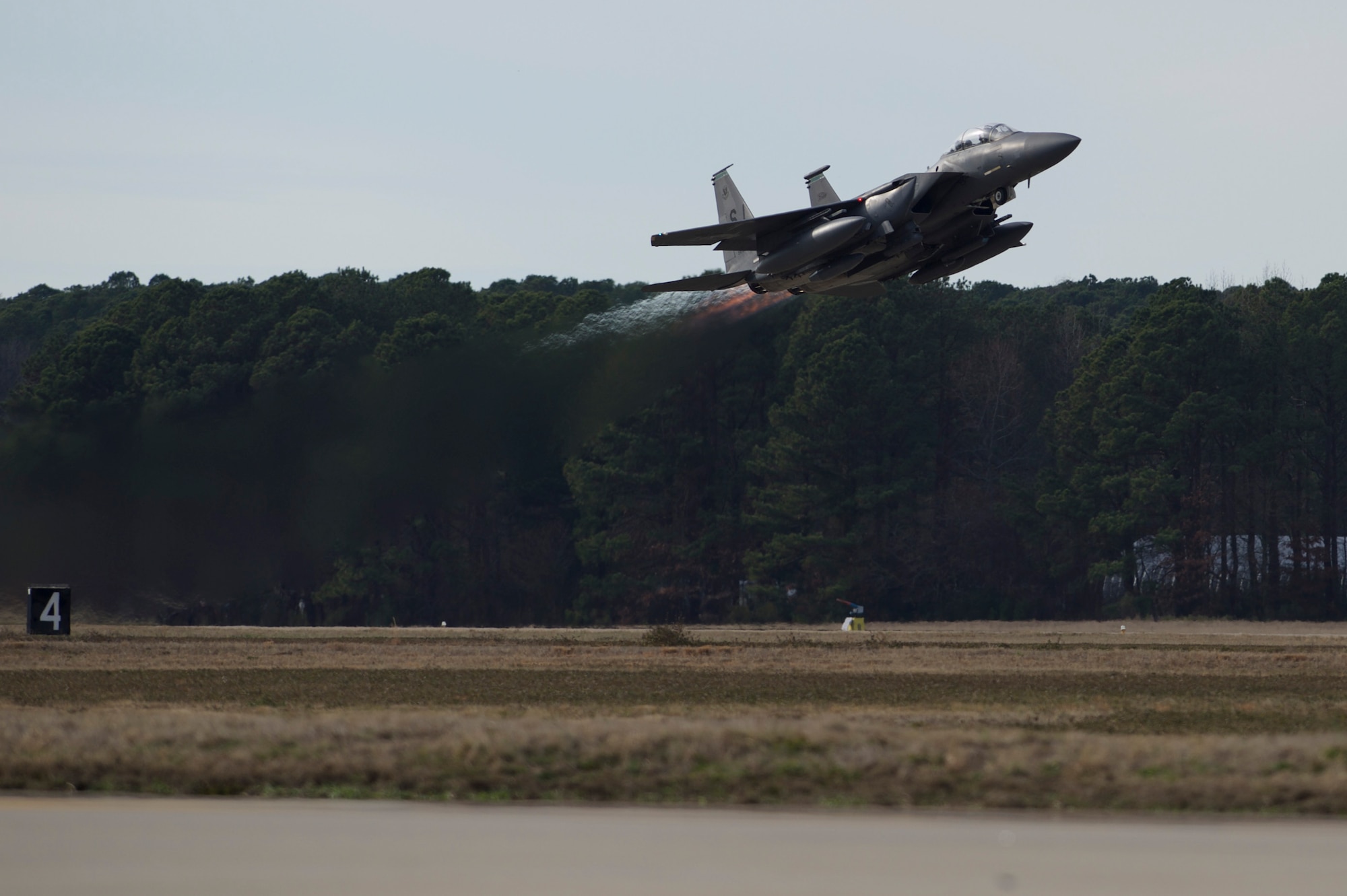 A U.S. Air Force F-15 Eagle from Seymour Johnson Air Force Base, NC, takes-off during practice for an inauguration flyover at Joint Base Langley-Eustis, Va., Jan. 19, 2017. F-15 Eagle, F-16 Fighting Falcon, F-22 Raptor and a F-35 Lighting II will fly in close formation during the inauguration of President-elect Donald J. Trump. (U.S. Air Force photo by Airman 1st Class Derek Seifert)