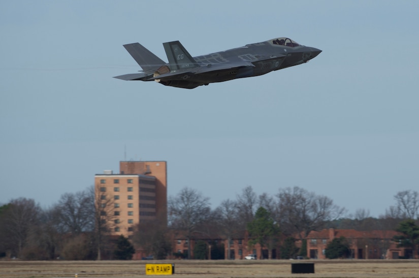 A U.S. Air Force F-35 Lightning II from Eglin Air Force Base, Fl., takes off during practice for an inauguration flyover at Joint Base Langley-Eustis, Va., Jan. 19, 2017. The F-35 and F-22 Raptor are fifth generation fighter aircraft that complement each other to establish and maintain air superiority. (U.S. Air Force photo by Airman 1st Class Derek Seifert)