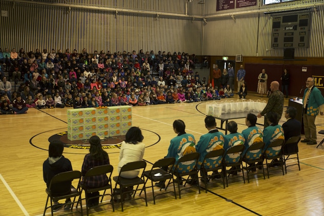 U.S. Marine Corps Col. Richard Fuerst, commanding officer of Marine Corps Air Station Iwakuni, expresses his gratitude to local farmers during the seventh annual mikan presentation at MCAS Iwakuni, Japan, Jan. 19, 2017. Local farmers presented the sweet, easy-to-peel citrus fruit, which is similar to Mandarin oranges, to students expanding their experience of Japanese cultures. (U.S. Marine Corps photo by Lance Cpl. Gabriela Garcia-Herrera)