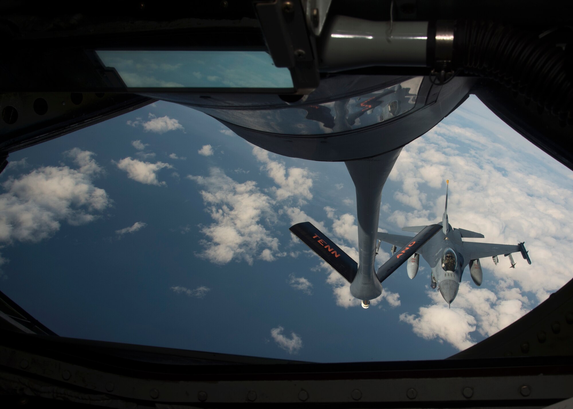U.S. Air Force pilots assigned to the 13th and 14th Fighter Squadrons conduct air-to-air refueling with a KC-135 Stratotanker assigned to the 134th Air Refueling Wing, Tennessee Air National Guard, over Northern Japan, Jan. 18, 2017. Pilots must maintain tanker qualification every six months to stay proficient and capable for training and combat scenarios. Since refueling training missions are very complex, they are vital for younger pilots to develop good skills and habit patterns that will help them in the future. (U.S. Air Force photo by Senior Airman Deana Heitzman)