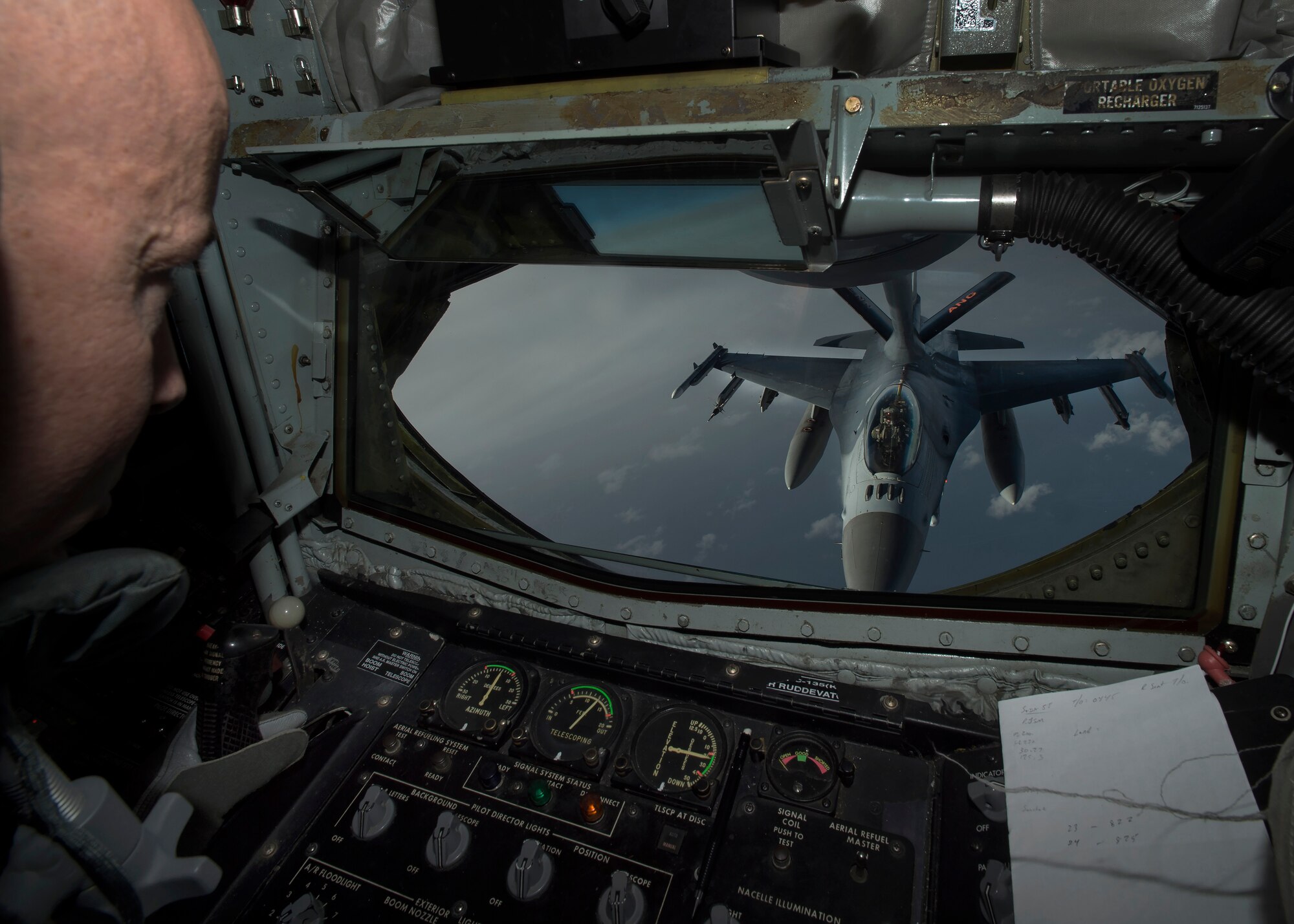 U.S. Air Force Master Sgt. Eric Jones, boom operator assigned to the 134th Air Refueling Wing, Tennessee Air National Guard, refuels 13th and 14th Fighter Squadron F-16 Fighting Falcon’s over Northern Japan, Jan. 18, 2017. Boom operators refuel various types of aircraft in midair, extending the amount of time spent on training or combat missions. (U.S. Air Force photo by Senior Airman Deana Heitzman)