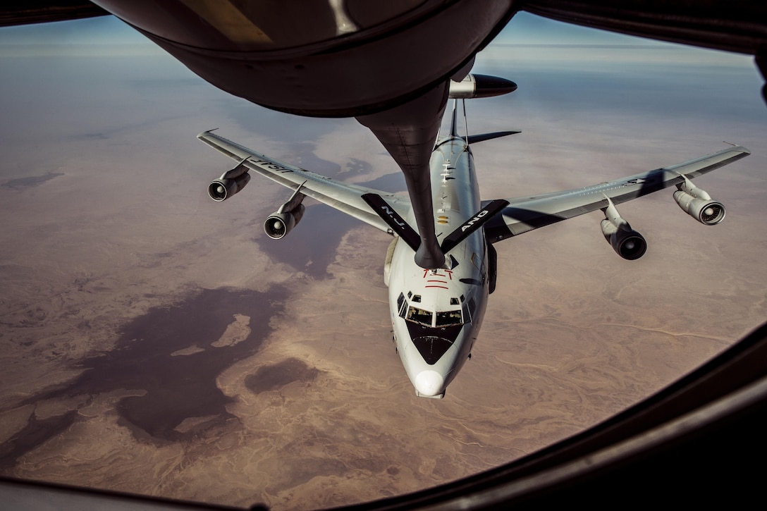 An Air Force E-3 Sentry refuels from a 340th Expeditionary Air Refueling Squadron KC-135 Stratotanker over Iraq, Jan. 18, 2017. The squadron extended the fight against the Islamic State of Iraq and the Levant by delivering fuel to the Sentry and Air Force F-16 Fighting Falcons. Air Force photo by Senior Airman Jordan Castelan