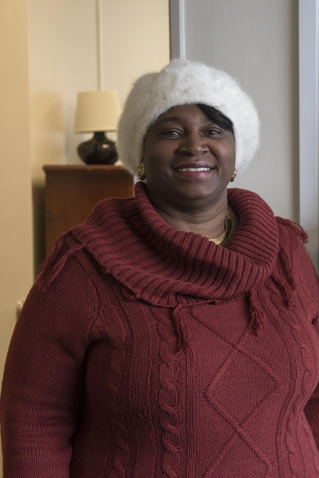 Bernice E. Milton, 374th Force Support Squadron community readiness specialist, poses for a photo at Yokota Air Base, Japan, Jan. 19, 2017. Milton is in charge of the Transition Assistance Program and helps ensure that separating service members meet all Career Readiness Standards as they transition from military to civilian life. (U.S. Air Force photo by Senior Airman David C. Danford)