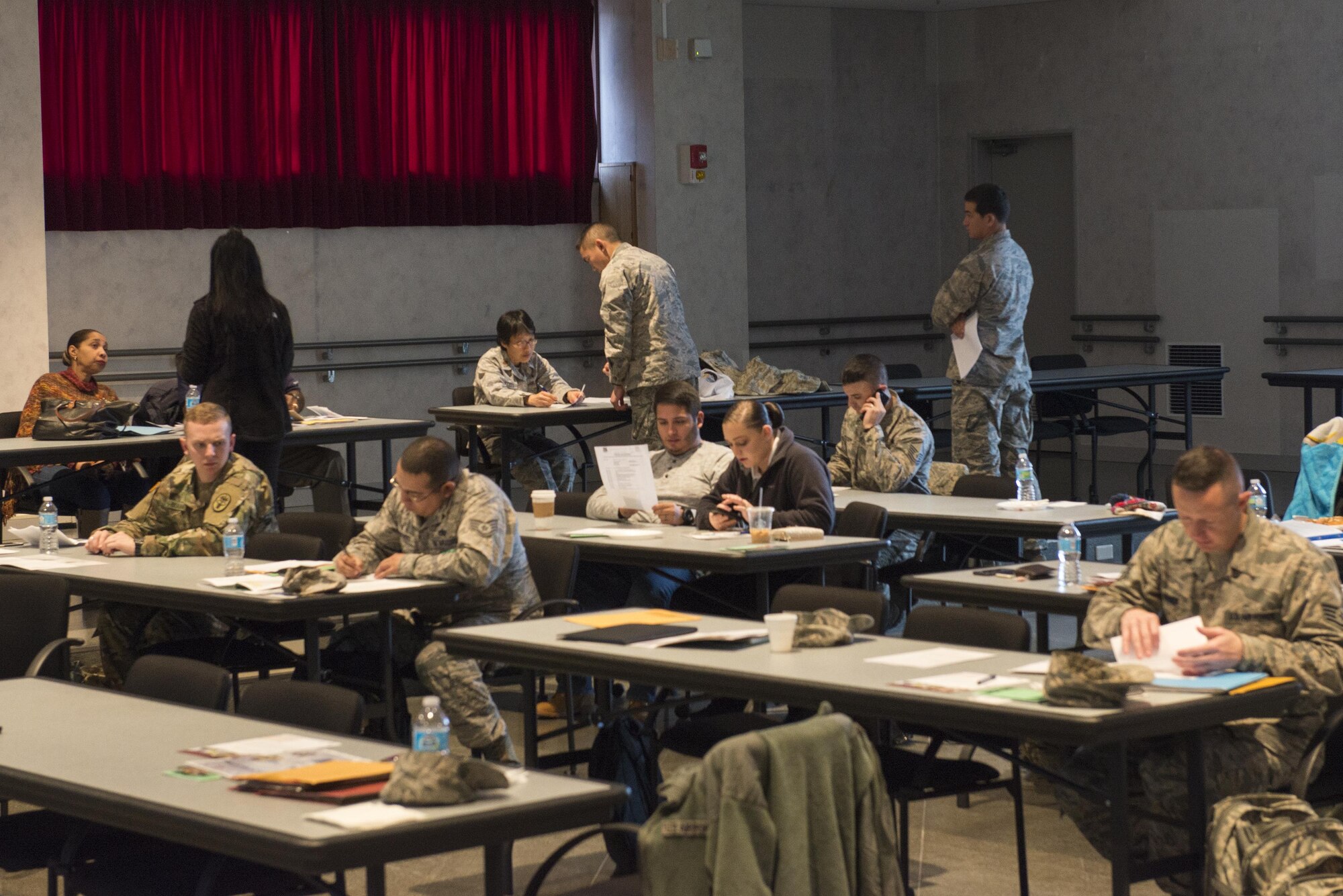 Service members and their families attend a Right Start course at Yokota Air Base, Japan, Jan. 19, 2017. The Right Start program provides mandatory briefings and assists newcomers in completing in-processing procedures. (U.S. Air Force photo by Senior Airman David C. Danford)