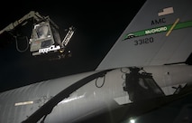 U.S. Air Force Reserve Senior Airman Brian Moolekamp, 945th Aircraft Maintenance Squadron electrical environmental systems, descends to the ground at Ramstein Air Base, Germany, Dec. 9, 2016. Moolekamp sprayed propylene glycol onto a C-17 Globemaster III to deice the aircraft before it took off. Airmen from multiple Reserve aircraft maintenance squadrons are on a temporary duty assignment at Ramstein to train with the 721st AMXS. (U.S. Air Force photo by Senior Airman Tryphena Mayhugh)