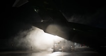 U.S Air Force Reserve Airmen assigned to the 945th Aircraft Maintenance Squadron spray propylene glycol onto a C-17 Globemaster III at Ramstein Air Base, Germany, Dec. 9, 2016. The propylene glycol is used throughout the winter months to deice aircraft before they depart. Airmen from multiple Reserve aircraft maintenance squadrons are on a temporary duty assignment at Ramstein to train with the 721st AMXS. (U.S. Air Force photo by Senior Airman Tryphena Mayhugh)