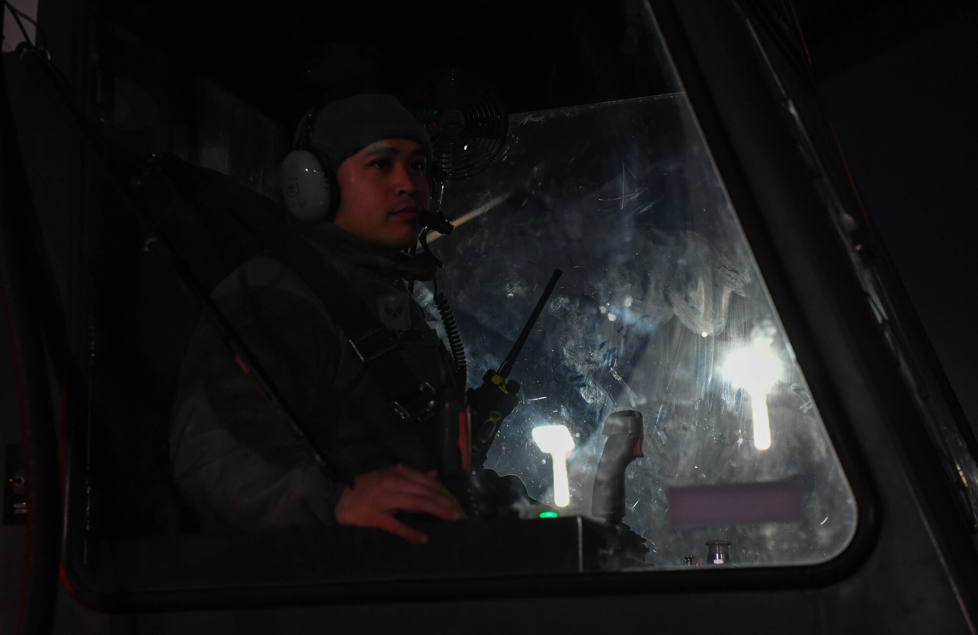 U.S Air Force Reserve Senior Airman José Agadier, 452nd Aircraft Maintenance Squadron C-17 Globemaster III crew chief, operates a boom to spray propylene glycol onto a C-17 aircraft at Ramstein Air Base, Germany, Jan. 19, 2017. The spray is used to deice aircraft throughout the winter months. Airmen from multiple Reserve aircraft maintenance squadrons are on a temporary duty assignment at Ramstein to train with the 721st AMXS. (U.S. Air Force photo by Senior Airman Tryphena Mayhugh)