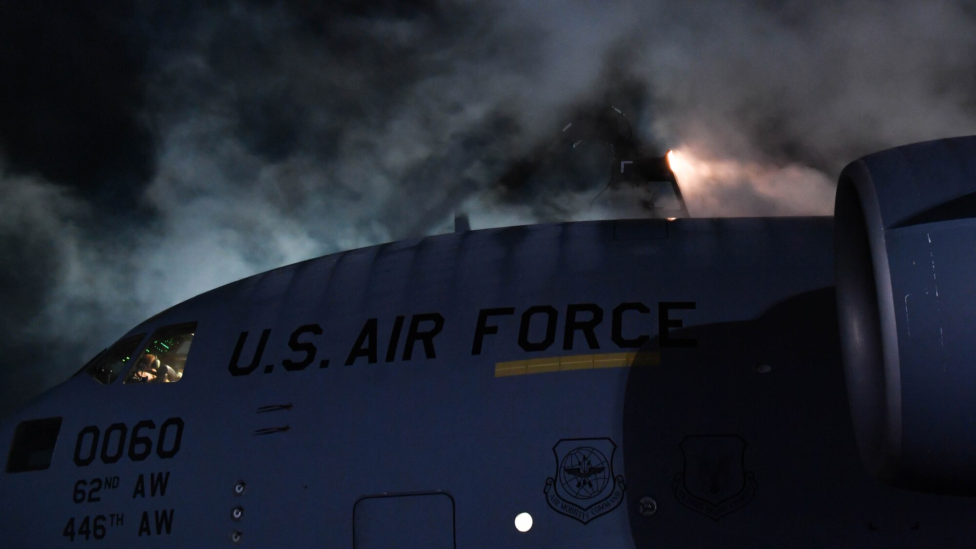Airmen deice a C-17 Globemaster III aircraft before it departs from Ramstein Air Base, Germany, Jan. 19, 2017. Propylene glycol was sprayed on the tail and wings of the aircraft to rid it of ice. Airmen from multiple U.S. Air Force Reserve aircraft maintenance squadrons are on a temporary duty assignment at Ramstein to train with the 721st AMXS. As a part of this training, many of the Airmen deice aircraft when it is required. (U.S. Air Force photo by Senior Airman Tryphena Mayhugh)