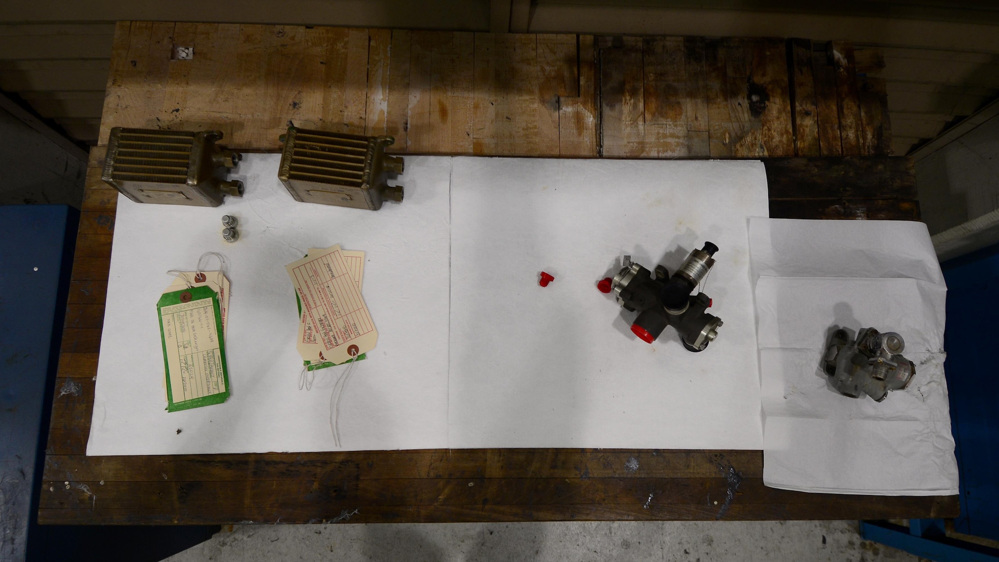 Power units and fuel components dry on absorbent pads during a fuel systems phase inspection at Aviano Air Base, Italy on Jan. 18, 2017. The phase inspection included close examination of the fuel lines and tanks for breaks and cracks. (U.S. Air Force photo by Senior Airman Cary Smith)