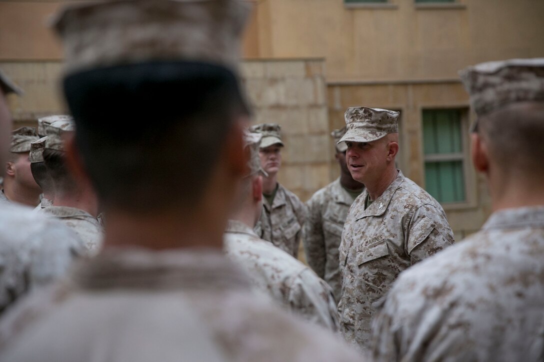 Col. Bill Vivian, Special Purpose Marine Air-Ground Task Force-Crisis Response-Central Command commanding officer, speaks with Marines from Company K, 3rd Battalion, 7th Marine Regiment, at the Baghdad Embassy in Iraq Dec. 27, 2016. Vivian expressed to the Marines the importance of their mission and the contribution they make to the SPMAGTF- CR-CC’s mission. SPMAGTF Marines enable Combined Joint Task Force Operation Inherent Resolve with security forces, strikes, and advise and assist teams, all of which support the Iraqis in their efforts to defeat ISIL.