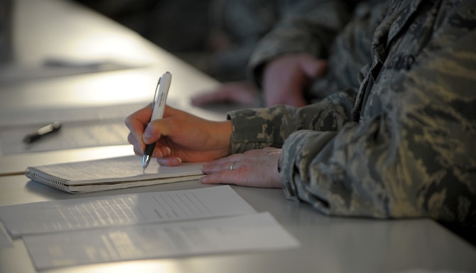 Col. Kelly Christy, 86th Aeromedical Evacuation Squadron commander, takes notes during a Continuous Process Improvement Senior Leader Course at Ramstein Air Base, Germany, Jan. 9, 2017. Christy was among more than 40 leaders, to include chief master sergeants, who attended one of the two courses held during the week. (U.S. Air Force photo by Staff Sgt. Timothy Moore)