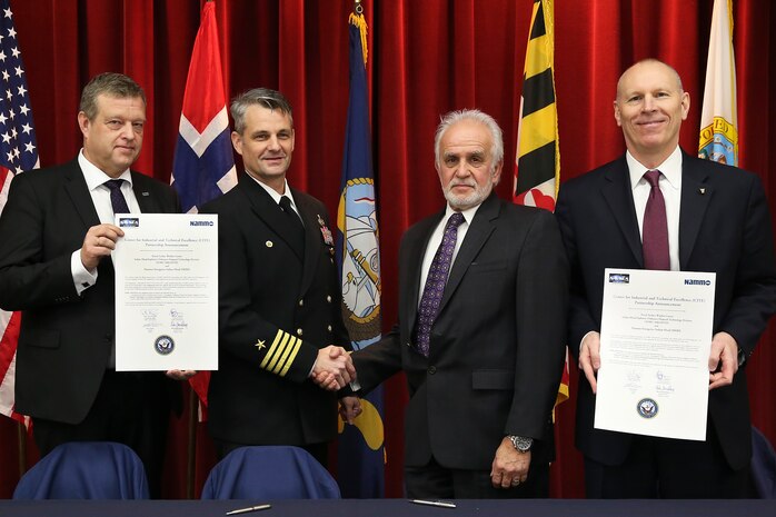 NSWC IHEODTD officially announced its partnership with Nammo Energetics Indian Head (NEIH), under the command's Center for Industrial and Technical Excellence (CITE) designation, Jan. 19. CITE is a statutory authority allowing public-private partnerships to perform work related to the command's core competencies. This designation allows the Navy to more efficiently maintain an organic energetics capability and manage under-utilized capacity. (Pictured left to right) President and CEO Nammo Group/Nammo AS, Morten Brandtzaeg; NSWC IHEODTD Commanding Officer, Capt. Scott Kraft; NEIH President, Peter Sioma; NSWC IHEODTD Technical Director, Ashley Johnson. 