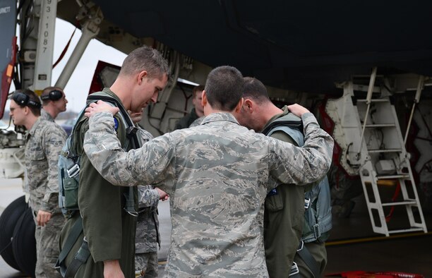 Brig. Gen. Paul W. Tibbets IV, the 509th Bomb Wing commander, welcomes home two B-2 Spirit stealth bomber pilots at Whiteman Air Force Base, Mo., Jan. 19, 2017. Two B-2 Spirit stealth bombers returned after flying an approximate 30-hour sortie in support of operations near Sirte, Libya. In conjunction with the Libyan Government of National Accord, the U.S. military conducted precision airstrikes Jan. 18, 2017, destroying two Daesh camps 45 kilometers southwest of Sirte. (U.S. Air Force photo by Senior Airman Joel Pfiester)