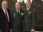 Capt. Timothy Thomas, right, stands with his father and grandfather after graduating flight school at Fort Rucker, Alabama, January 2009. Thomas, a North Carolina National Guard member with 1st Battalion, 130th Aviation Regiment, is the third in a line of Army Aviators and the fourth generation of the Thomas family to join the military.