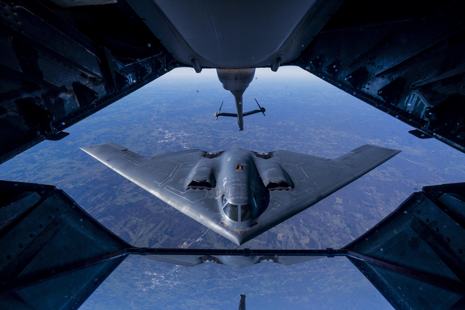 A 2nd Air Refueling Squadron KC-10 Extender from Joint Base McGuire-Dix-Lakehurst, N.J., prepares to refuel a B-2 Spirit, during a training exercise near Kansas, Nov. 10, 2016. The KC-10 Extender is an Air Mobility Command advanced tanker and cargo aircraft designed to provide increased global mobility for U.S. armed forces. Although the KC-l0's primary mission is aerial refueling, it can combine the tasks of a tanker and cargo aircraft by refueling fighters and simultaneously carry the fighter support personnel and equipment on overseas deployments. (U.S. Air Force photo by Senior Airman Keith James/Released)