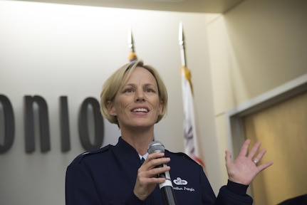 U.S. Air Force Brig. Gen. Heather Pringle, 502nd Air Base Wing and Joint Base San Antonio commander, delivers a speech during the Kelly Field 100th Anniversary Celebration at Port San Antonio Headquarters in San Antonio. Although Kelly Air Force Base, which housed Kelly Field, formally closed in 2001, many aircraft maintenance jobs were retained by Port San Antonio and its partners. 