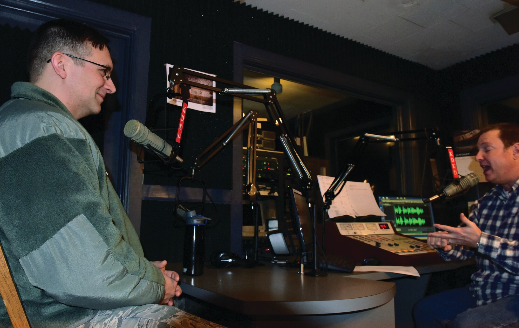 U.S. Air Force Airman 1st Class Michael Heatherly, an aircrew flight equipment technician assigned to the 509th Operations Support
Squadron, sits with David Lee, the KDKD News & Public Affairs Director, prior to going live on the Whiteman Speak Out
program at Clinton Mo., Jan. 12, 2017. David Lee has been hosting the Whiteman Speak Out program since 2003 when he arrived
to the radio station.