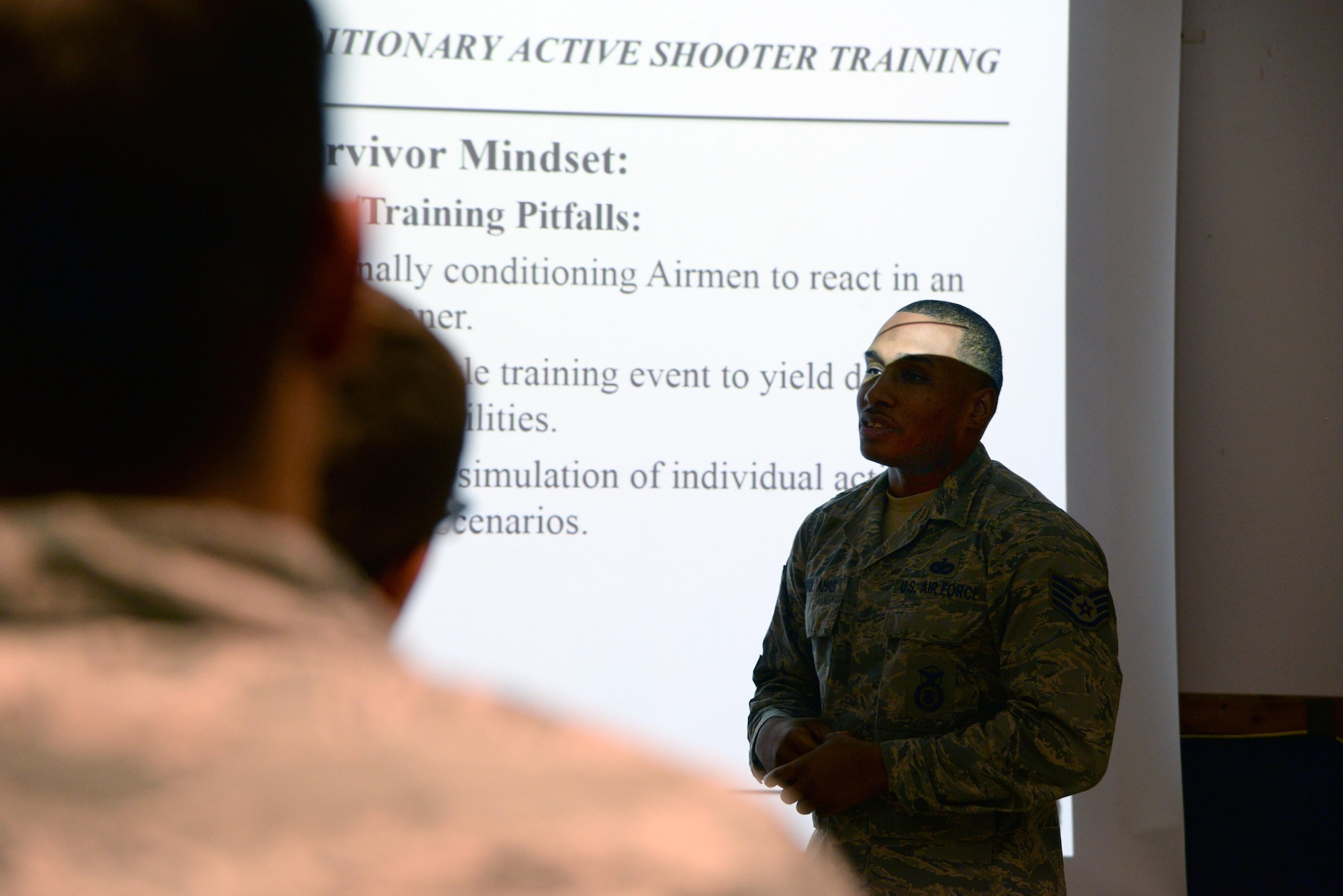 Staff Sgt. Karriem Abdulahad, 86th Security Forces Squadron training instructor, teaches the Expeditionary Active Shooter Training course information to his students at Ramstein Air Base, Germany, Dec. 15, 2016. The EAST course teaches Airmen preparing to deploy how to handle an active shooter situation in a practical manner that can be used day-to-day. (U.S. Air Force photo by Airman 1st Class D. Blake Browning)