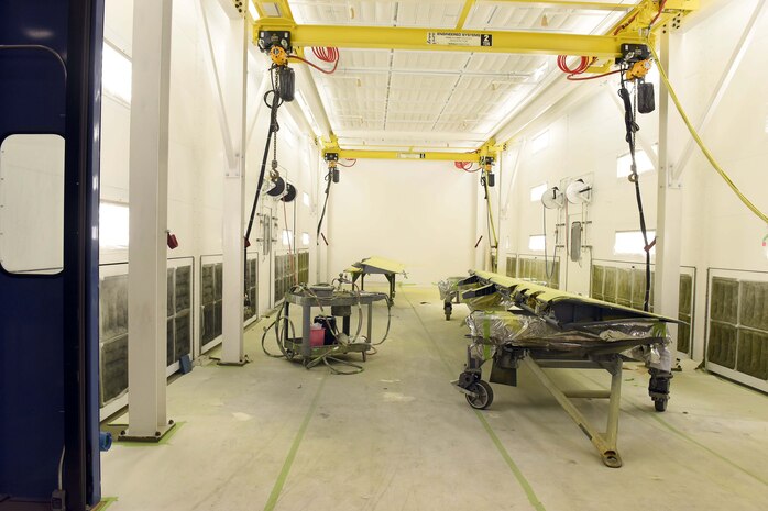 Three newly installed paint booths at a 571st Commodities Maintenance Group paint facility have drastically decreased production time, work hazards, health hazards and environmental impact simultaneously. The 50 feet deep by 20 feet wide paint booths are enclosed structures used for painting large assets from various military aircraft.