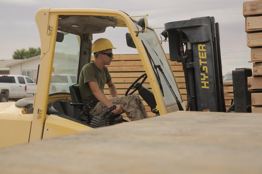 Cpl. Layton Knight, assigned through the fleet assistance program with Headquarters and Headquarters Squadron, assists with range maintenance by pre-fabricating wooden targets to support tenant and visiting commands during Weapons and Tactics Instructors course 1-17 aboard Marine Corps Air Station Yuma, Ariz., September 29, 2016.