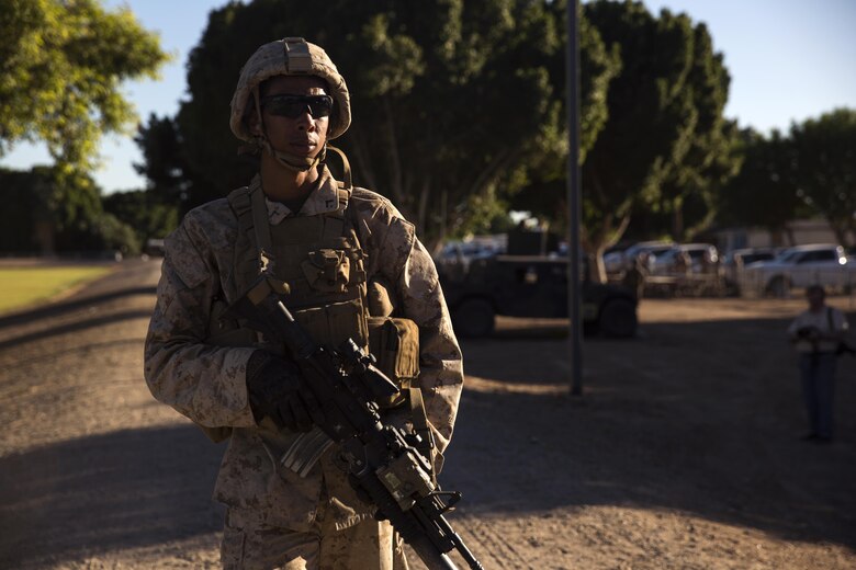 A Marine with 2nd Battalion, 3rd Marine Regiment, based out of Marine Corps Base Hawaii, provides security at Kiwanis Park in Yuma, Ariz., during a Humanitarian Assistance/Disaster Relief (HA/DR) Exercise hosted by Marine Aviation Weapons and Tactics Squadron One during the Weapons and Tactics Instructor Course 1-17, Friday, October 14, 2016. The exercise was conducted to test and improve student capabilities to evaluate, plan and execute support to civilians impacted by conflict and/or natural disasters through a real-world scenario that requires quick reaction forces to extract U.S. and allied forces personnel from hostile environments. 