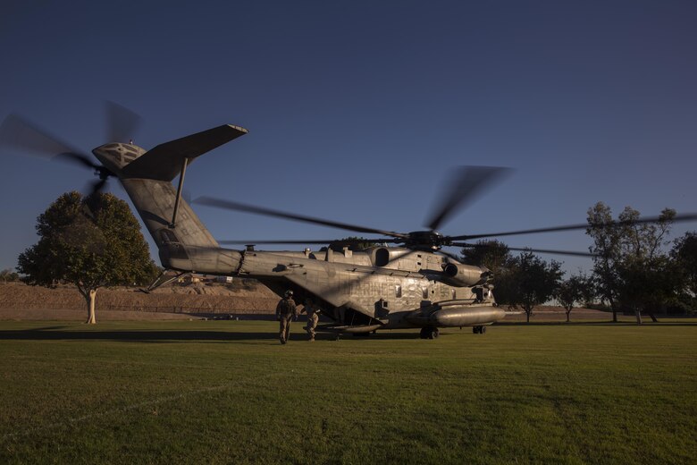 A CH-53E helicopter, with Marine Aviation Weapons and Tactics Squadron One offloads personnel to render aid and provide disaster relief to displaced civilians, role-players, at Kiwanis Park in Yuma, Ariz. during a Humanitarian Assistance/Disaster Relief (HA/DR) Exercise, part of the Weapons and Tactics Instructor Course 1-17, Friday, October 14, 2016. The training exercise enabled ground, aviation and support Marines and sailors to work as a team to practice deploying medical personnel, supplies, and extract personnel and people displaced from their communities.