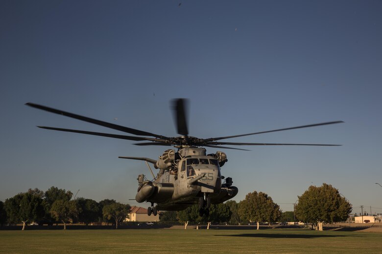 A CH-53E helicopter, with Marine Aviation Weapons and Tactics Squadron One lands to offload personnel to render aid and provide disaster relief to displaced civilians, role-players, at Kiwanis Park in Yuma, Ariz. during a Humanitarian Assistance/Disaster Relief (HA/DR) Exercise, part of the Weapons and Tactics Instructor Course 1-17, Friday, October 14, 2016. The training exercise enabled ground, aviation and support Marines and sailors to work as a team to practice deploying medical personnel, supplies, and extract personnel and people displaced from their communities.