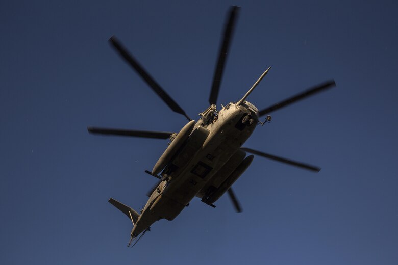 A CH-53E helicopter, with Marine Aviation Weapons and Tactics Squadron One flies overhead at Kiwanis Park in Yuma, Ariz. during a Humanitarian Assistance/Disaster Relief (HA/DR) Exercise, part of the Weapons and Tactics Instructor Course 1-17, Friday, October 14, 2016. The training exercise enabled ground, aviation and support Marines and sailors to work as a team to practice deploying medical personnel, supplies, and extract personnel and people displaced from their communities. 