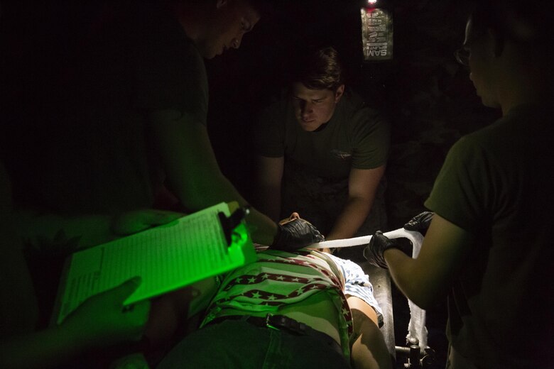 Sailors attached to the 2nd Battalion, 3rd Marine Regiment, based out of Marine Corps Base Hawaii, provide medical aid at Kiwanis Park in Yuma, Ariz., during a Humanitarian Assistance/Disaster Relief (HA/DR) Exercise hosted by Marine Aviation Weapons and Tactics Squadron One during the Weapons and Tactics Instructor Course 1-17, Friday, October 14, 2016. 