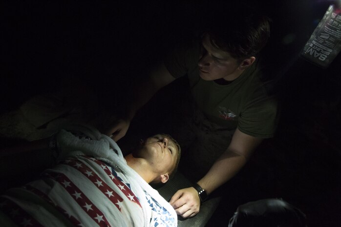 Sailors attached to the 2nd Battalion, 3rd Marine Regiment, based out of Marine Corps Base Hawaii, provide medical aid at Kiwanis Park in Yuma, Ariz., during a Humanitarian Assistance/Disaster Relief (HA/DR) Exercise hosted by Marine Aviation Weapons and Tactics Squadron One during the Weapons and Tactics Instructor Course 1-17, Friday, October 14, 2016. 