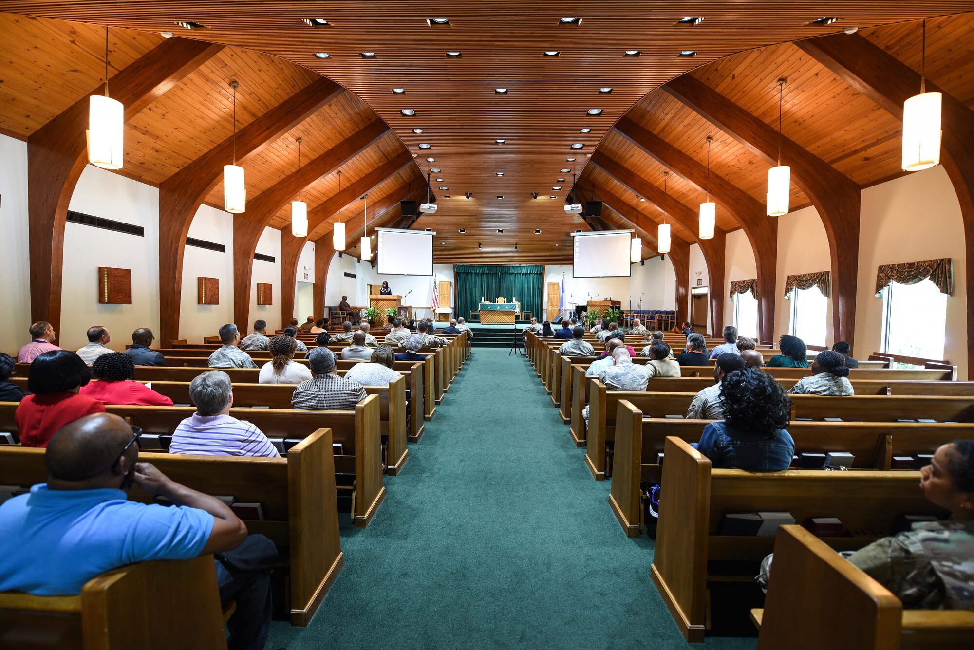 Nearly 100 Air Commandos, active duty and retired, gather for the annual Martin Luther King Jr. Commemorative Service at the Hurlburt Field Chapel, Jan. 12, 2017. King was a minister and leader during the Civil Rights Movement, best known for his role in the advancement of civil rights using nonviolent civil disobedience. (U.S. Air Force photo by Senior Airman Jeff Parkinson)