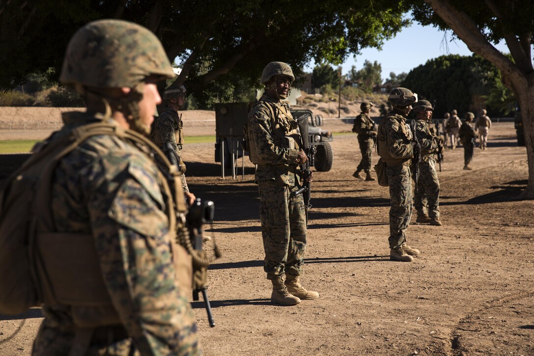 Marines with 3rd Low Altitude Air Defense Battalion, based out of Marine Corps Base Camp Pendleton, Calif., provide security at Kiwanis Park in Yuma, Ariz., during a Humanitarian Assistance/Disaster Relief (HA/DR) Exercise as part of the Weapons and Tactics Instructor Course 1-17, hosted by Marine Aviation Weapons and Tactics Squadron One, Friday, October 14, 2016. The exercise was conducted to test and improve student capabilities to evaluate, plan and execute support to civilians impacted by conflict and/or natural disasters through a real-world scenario that requires quick reaction forces to extract U.S. and allied forces personnel from hostile environments.