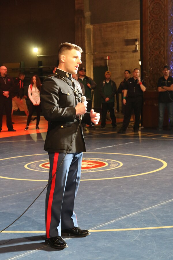 Capt. Michael Brant, officer-in-charge, All-Marine Wrestling Team, delivers opening remarks about a fallen Marine during the Tim Brown Memorial Tournament at Memorial Auditorium in Sacramento, Jan. 13, 2017. Brant spoke about the toughness and warrior spirit of wrestlers and related that quality to Lance Cpl. Timothy W. Brown, a Sacramento native and former Foothill High School wresters who was killed in action in Al Anbar province, Iraq, on Nov. 15, 2006, while serving as an infantryman with 2nd Battalion, 3rd Marine Regiment. Each year, his alma matter hosts a wrestling tournament featuring hundreds of top-tier athletes from throughout California.
(U.S. Marine Corps photo by Staff Sgt. Jacob H. Harrer)